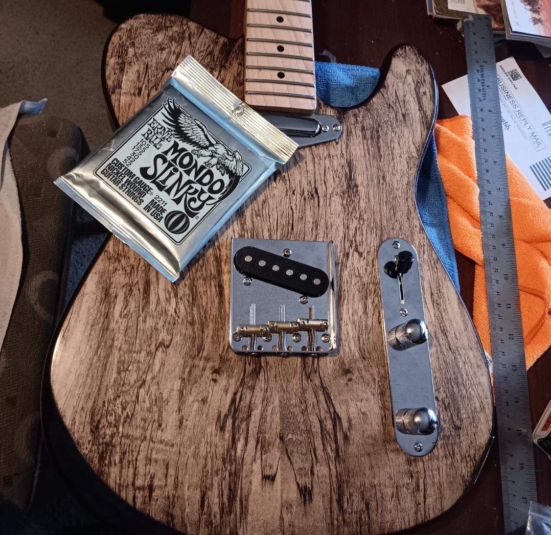 Finished TE style guitar kit with spalted maple veneer built by customer Clifton Montgomery